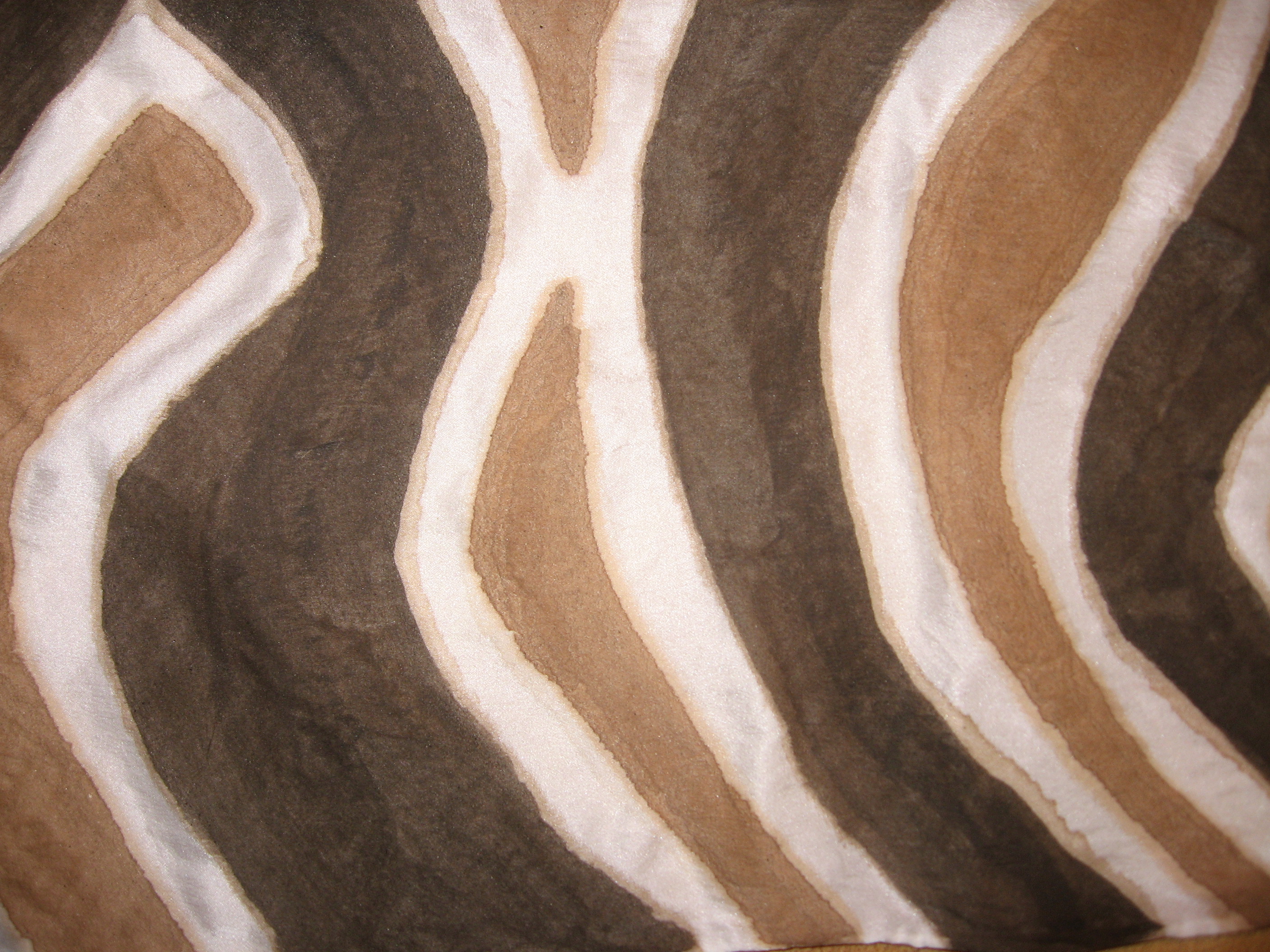 black and brown mud on silk
